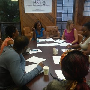 Volunteers meet to discuss homeless issues and solutions
